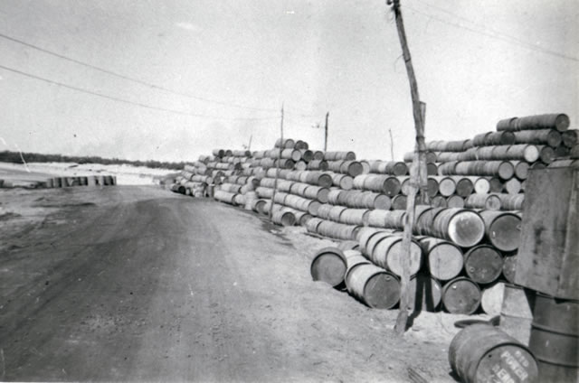 Fuel drums along the strip road